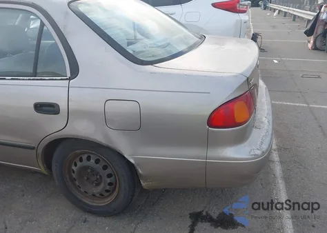 1998 Toyota Corolla Ce из США, поврежденный, VIN 2T1BR12E6WC083784